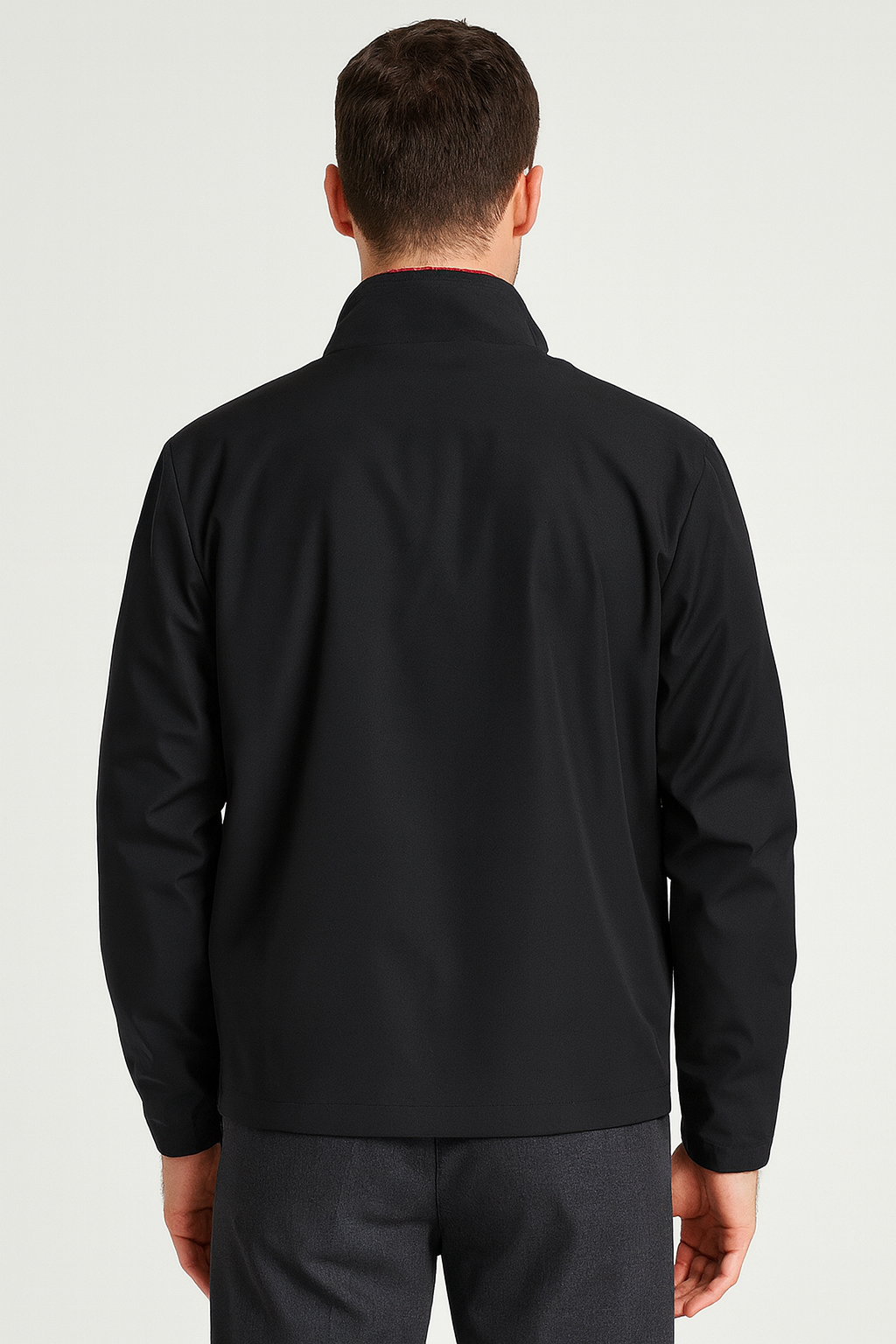 Back view of men’s black stand collar jacket with stand-up collar and smooth tailored finish – product shot